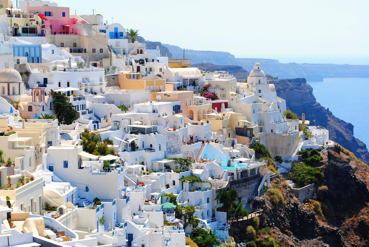Whitewashed Greek island village overlooking the sea