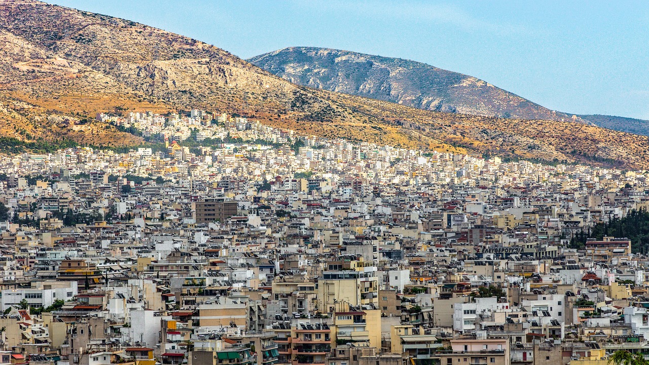 View of the Acropolis and Athens cityscape in warm light