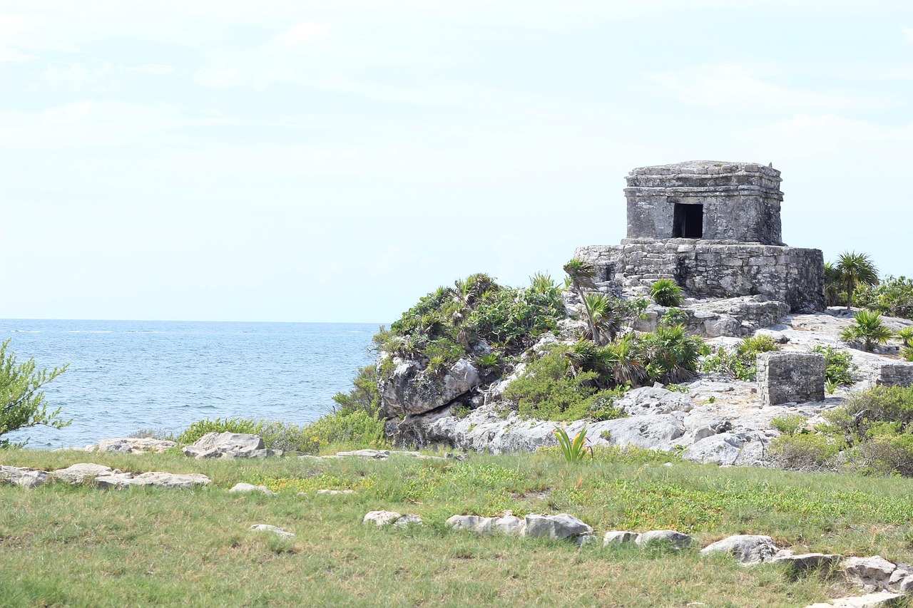 Caribbean coast in Mexico with bright blue water and sandy beach near Cancun and Tulum