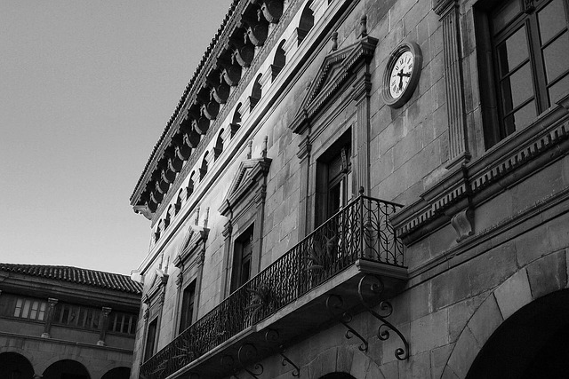 Historic Barcelona street with warm light and traditional buildings
